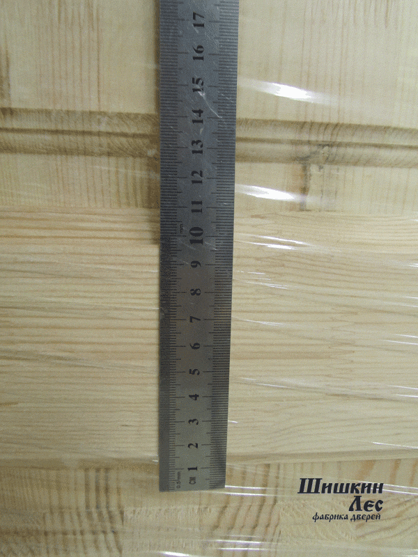 Линейкой показана ширина внутренней перемычки двергоно полотна, которая составляет 105 мм.