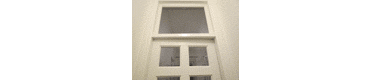 Межкомнатная дверь из массива с фрамугой. Покрашена в белый цвет.