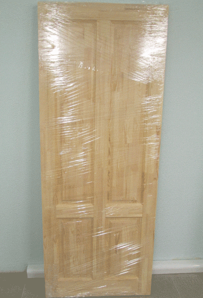 Фото готовой двери СОФИЯ после изготовления. Упакована в плёнку.